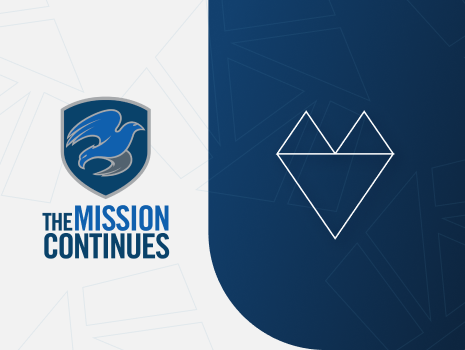 The Mission Continues logo on white background with blue block to the right with line heart icon