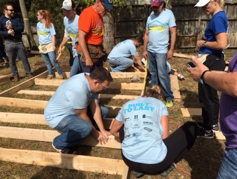 UTRS employees working on Habitat for Humanity project