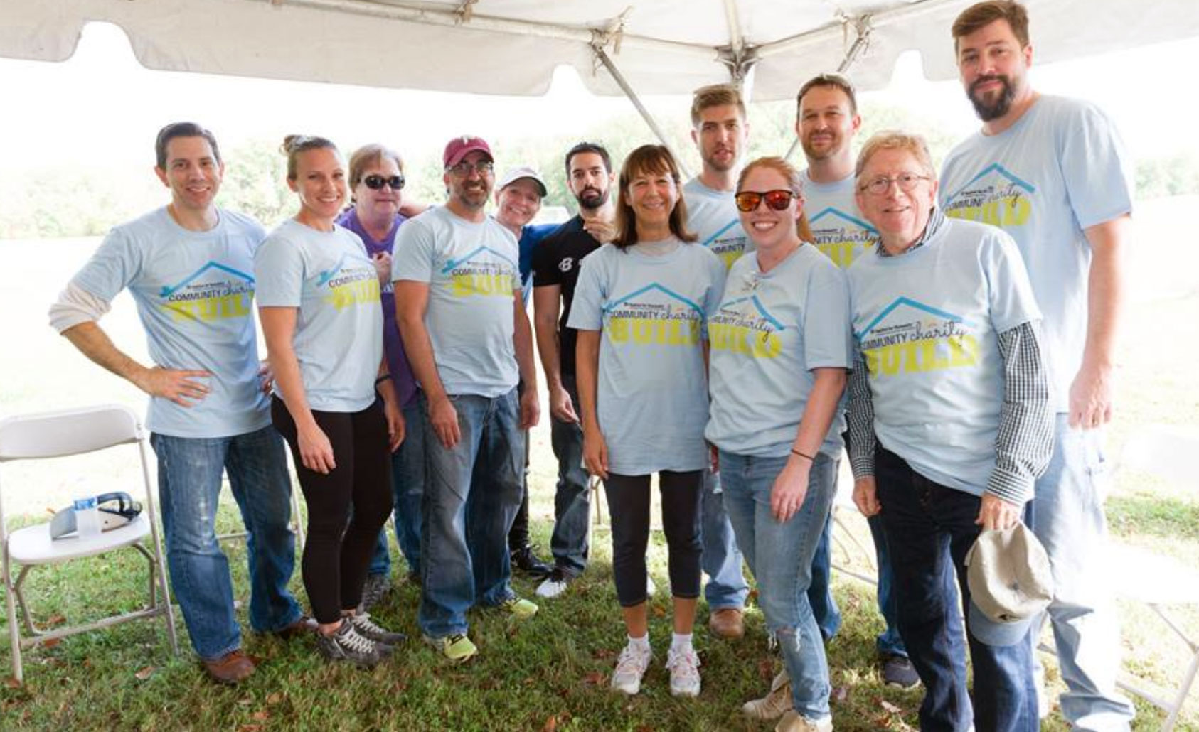 Group photo of UTRS employees who participated in Habitat for Humanity.