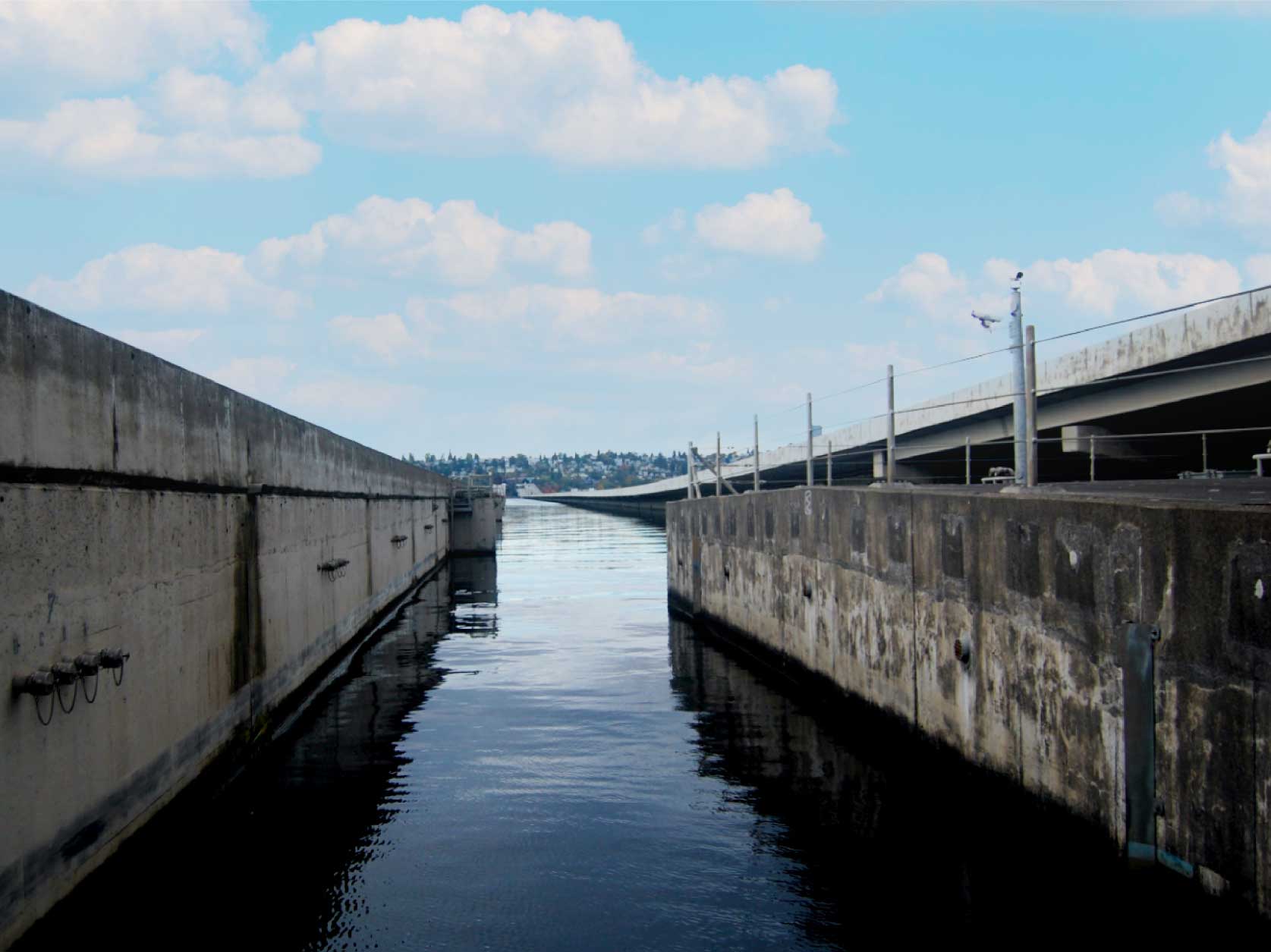 ng west from Mercer Island toward Seattle between the Homer M. Hadley Memorial Bridge and Lacey V. Murrow Bridge