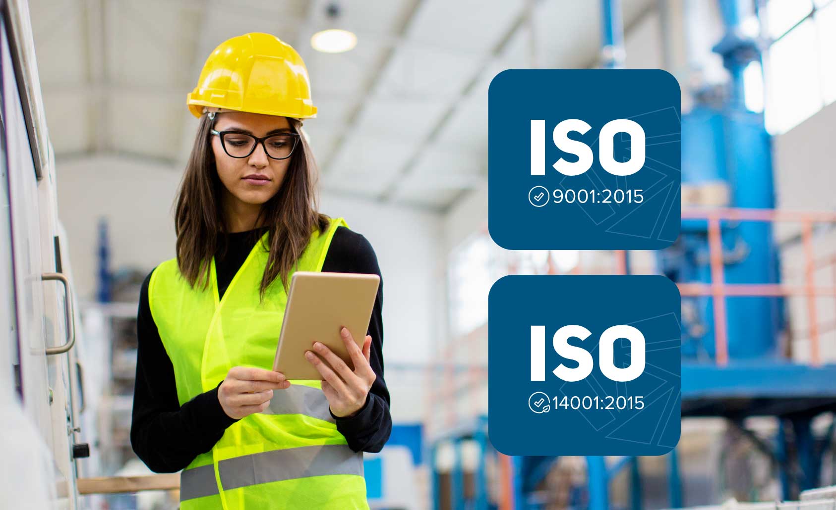 Female at factory in a vest checking things. Image has ISO certification icons for ISO 9001:2015 and ISO 14001:2015.