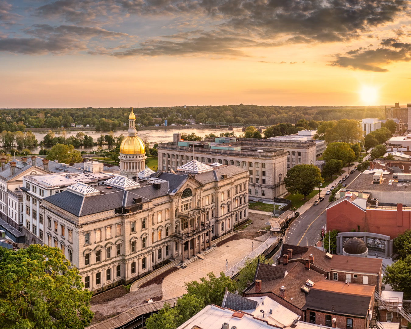 Aerial panorama of Trenton New Jersey skyline and state capitol at sunset. Trenton is the capital city of the U.S. state of New Jersey and the county seat of Mercer County.